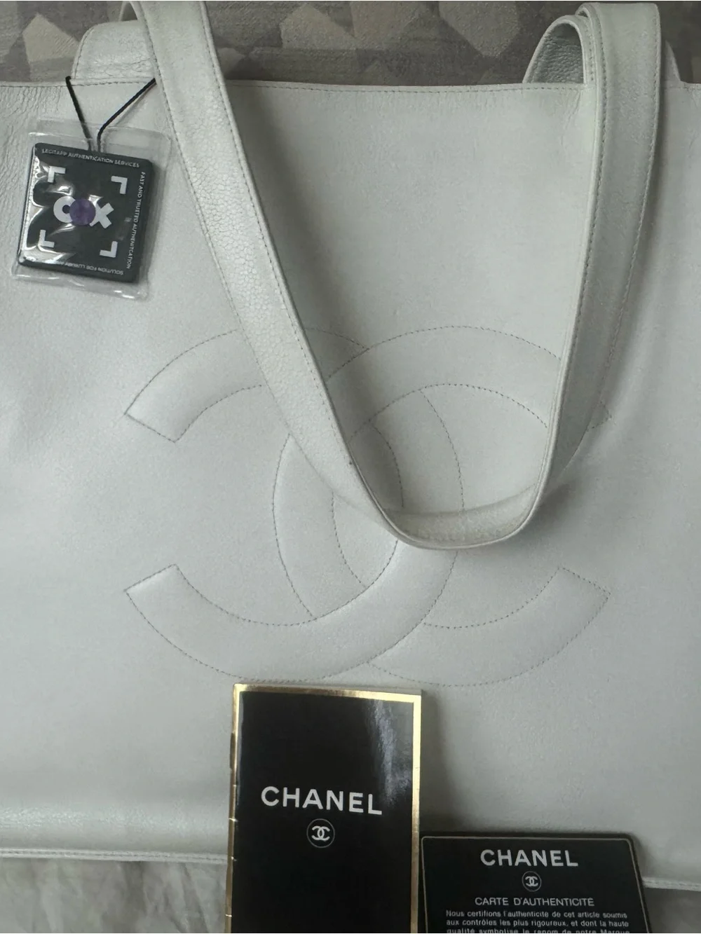 Authentic CHANEL White Leather Tote with Embossed CC Logo
